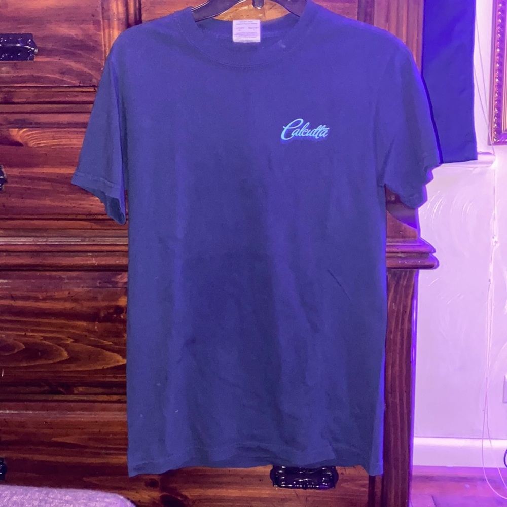 Calcutta. We Fish Like You, Only Prettier graphic tee.